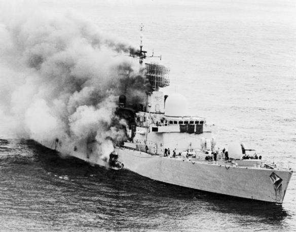 The destroyer the HMS Sheffield on fire during the Falklands War, 4th May 1982.